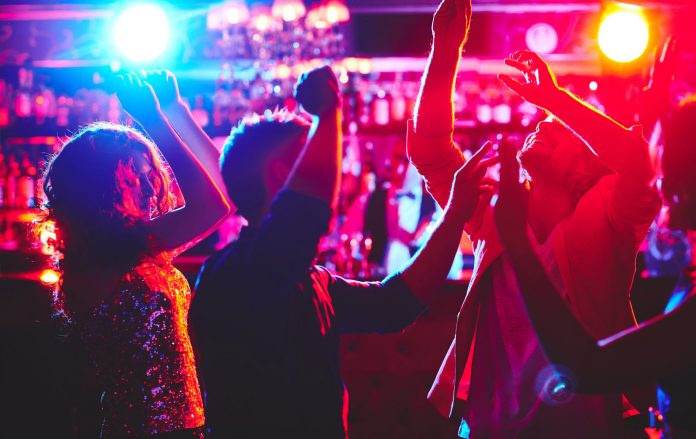 people dancing at a nightclub